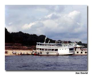 Amazon River boats allow visitors close-up views of the jungle.