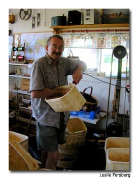 Björn Majors uses traditional tools and methods to craft his classic wood-strip baskets.
