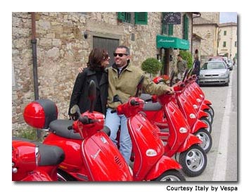 Two Italy by Vespa guests enjoy a quiet moment before heading out for a another perfect day of riding in Tuscany.