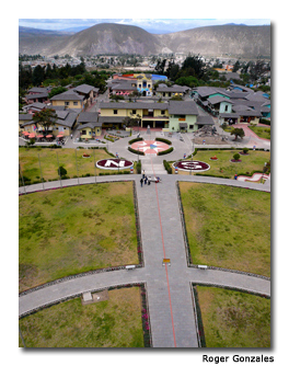 An aerial view of the equator includes the “Mitad del Mundo” tourist complex in the background.
