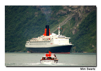 A tender from the QE2 ferries passengers from the ship to the town of Geiranger in western Norway.