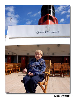Bea Muller, a permanent resident of the Queen Elizabeth 2, relaxes on the ship’s sun deck.