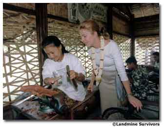 Queen Noor of Jordan, seen here on a trip to Asia, is among the many notable supporters of Landmine Survivors Network.