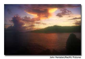 The sun sets over Tutuila Island, American Samoa.
