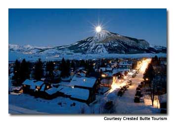 The sun fades behind the mountain as another day on the slopes draws to a close.