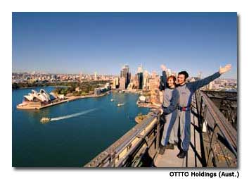 The staggering view atop the bridge is all the incentive these climbers need to reach their destination.