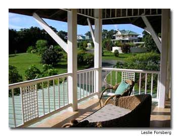 The hilltop villas are surrounded by beautifully manicured grounds filled with tropical plants; guests can pick their own papayas and bananas.