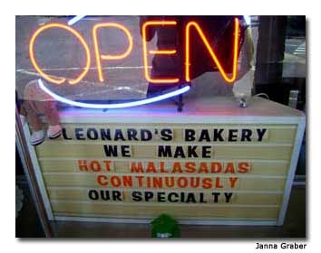 Hawaii Food Tours introduces visitors to popular Hawaiian foods such as malasadas, Portuguese fried-dough confections.