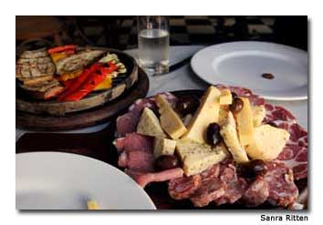 In addition to getting the news and spending time with friends the pulperias also serve beer and wonderful local fare.