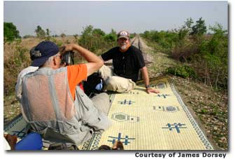 The author aboard the Cambodian bamboo train