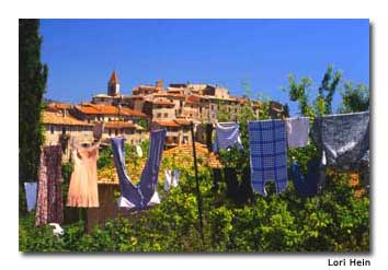 Laundry flaps in the breeze in Gorbio, France, set high on a rocky precipice. 