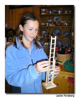 Kirsten was transfixed by the simple pleasures of a tumbling ladder toy.