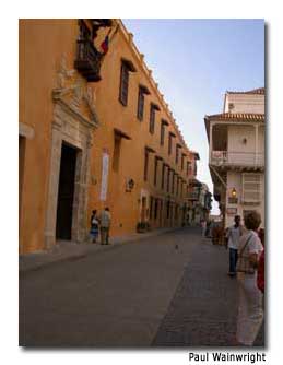 Many streets in Cartagena are lined with Colonial-style buildings.