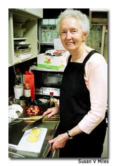 Susan practices her new Japanese cooking skills.