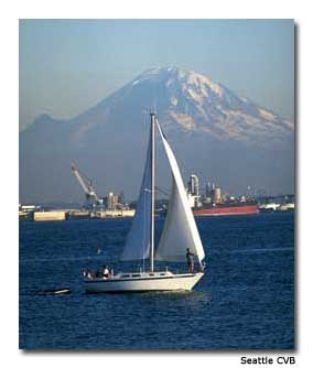 Mount Rainier forms a scenic backdrop to boaters on Puget Sound.