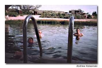 Campers soak in the natural hot pool at Virginia Springs.