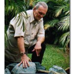 From his workshop in Antigua, Guatemala, geologist Jay Ridinger demonstrates the beauty of a boulder of Olmec Blue Jade before it is cut into gemstones.