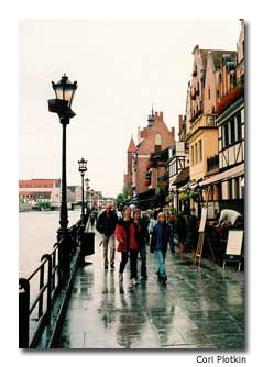 Crowds of people walk theGdansk waterfront in search ofthe perfect memento.