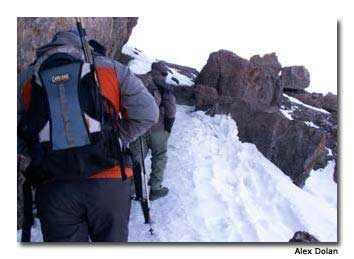 Hikers close in on Uhuru Peak, the summit of Kilimanjario.