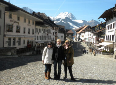 The author and her friends, Esther and Melanie, exploring the village of Gruyeres, Switzerland.