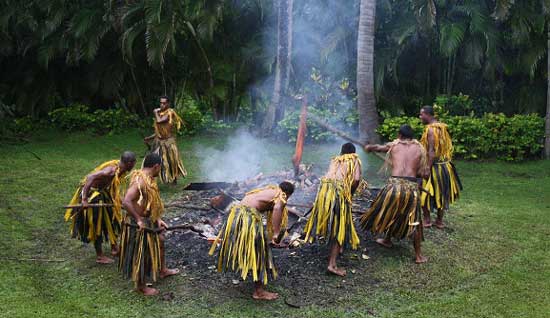 Preparing for the firewalking ritual in Fiji. Photo by Richard Varr