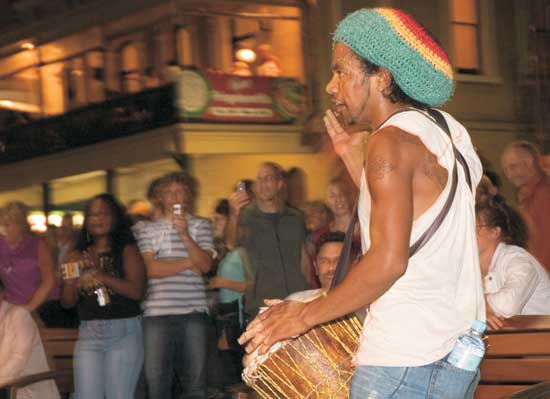 A drummer entertains the crowds at the Adelaide Fringe Festival in South Australia. Photo by SATC