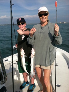 Kyle and Lisa (author) show off their Ladyfish, after a hard-fought struggle.