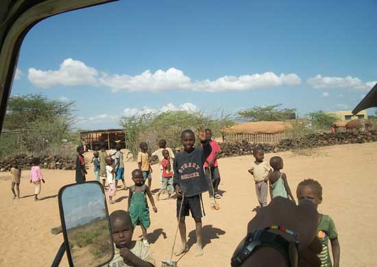 Children gathering outside of Umoja Uaso Women's Group village when they see Bushka pull up. Photo by Cece Wildeman
