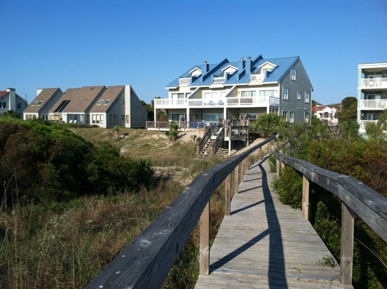 Tybee Island has many beach cottages right along the shore, such as this one by Oceanfront Cottage Rentals. Photo by Janna Graber