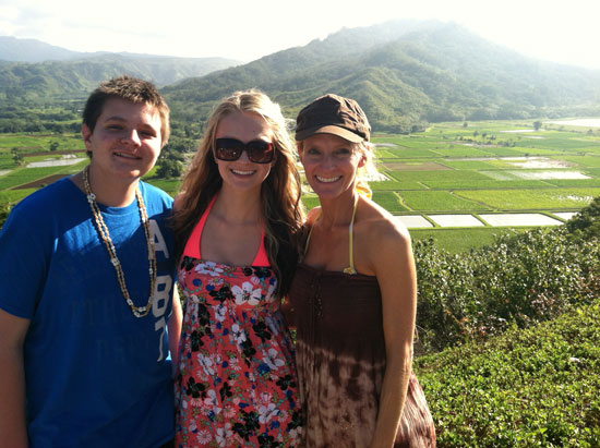 The author with two of her children at the Hanalei Valley Lookout Point. 