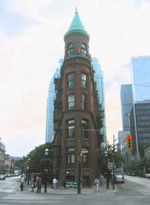 Historic Flat iron building poses a sharp contrast to the city's modern architecture. Photo by Claudia Carbone