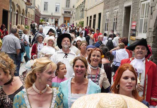 I can't help but laugh as my friends and I take part in the New France Festival Parade. Photo by Bill King