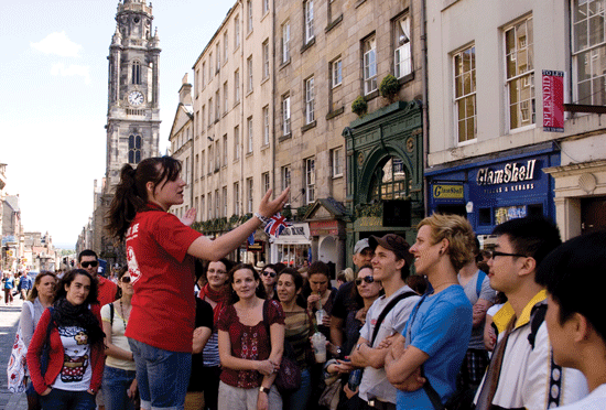A Sandeman guide entertains a tour group on the historic Royal Mile. Photo courtesy of Sandeman