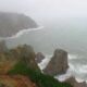Waves crashing into the Cabo Da Roca cliffs, breaking the stillness of the ocean. Photo by Monica Gray