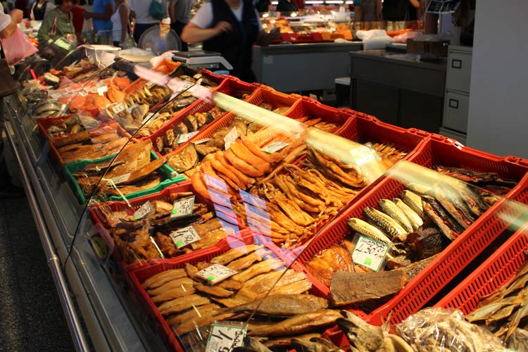 Cases filled with smoked fish in Riga Central Market. Photo by Janna Graber