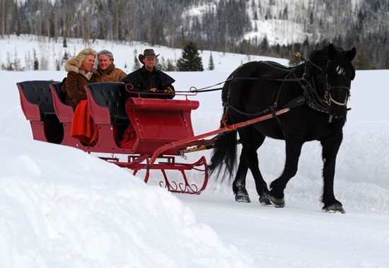 Enjoying a sleigh ride at one of Colorado's luxury dude and guest ranches. Photo by Colorado Dude & Guest Ranch Association