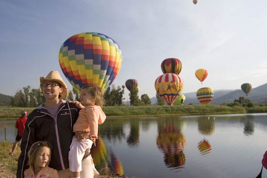 A family outing during a balloon festival in Steamboat Springs. Photo by Matt Inden/Colorado Tourism Office