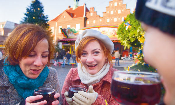 Drinking Gluhwein is a favorite tradition. Photo by GNTO