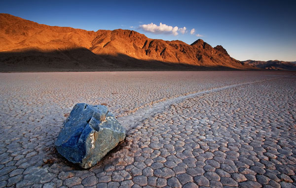 In California's Death Valley, huge stones were moved by unknown forces, leaving long traces.