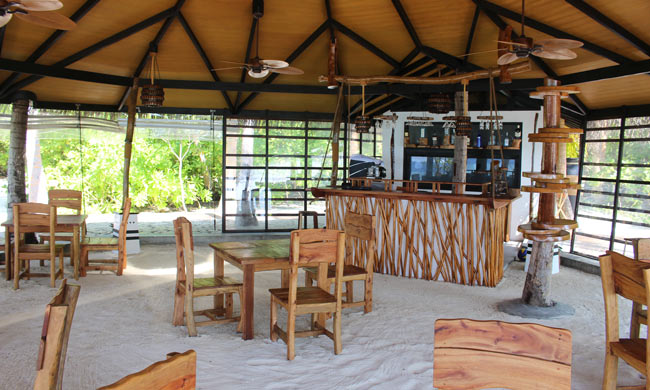 Open-air bar at AaaVeee in the Maldives. Photo by Janna Graber