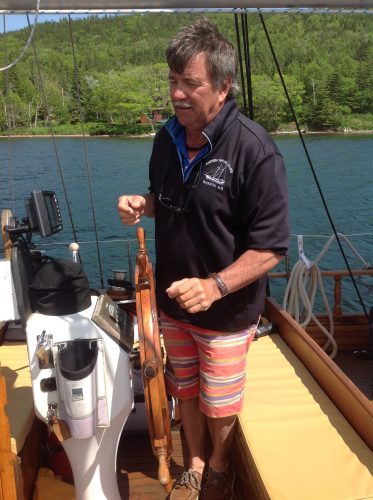 Captain John sails the Amoeba Schooner. Photo by 