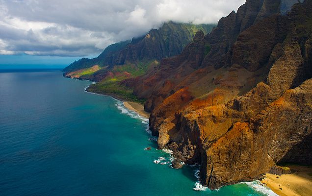 This fifteen-mile stretch of coastline is located on the northwest shore of Kauai. Much of Na Pali Coast is inaccessible due to its characteristic sheer cliffs that drop straight down into the ocean.This fifteen-mile stretch of coastline is located on the northwest shore of Kauai. Much of Na Pali Coast is inaccessible due to its characteristic sheer cliffs that drop straight down into the ocean.