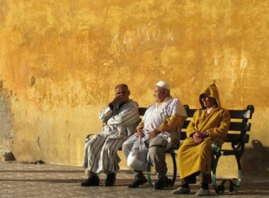 Moroccan men sitting. Photo by Flickr/Carlos ZGZ