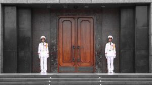 Two sentries guard the entrance to the Ho Chi Minh Mausoleum, Ba Dinh Square, Hanoi, Vietnam. Photo by Flickr/joolsgriff