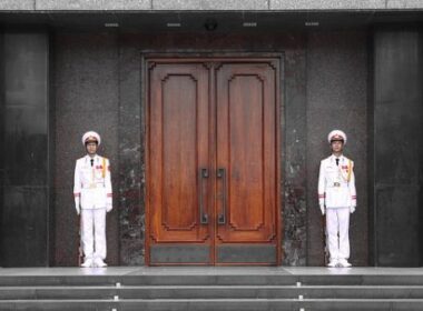 Two sentries guard the entrance to the Ho Chi Minh Mausoleum, Ba Dinh Square, Hanoi, Vietnam. Photo by Flickr/joolsgriff