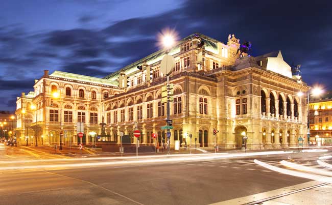 The Vienna Opera House at night.