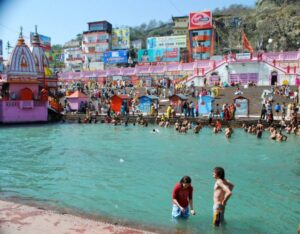 In the Ganges for Kumbh Mela. Photo by Rafaela Schneider