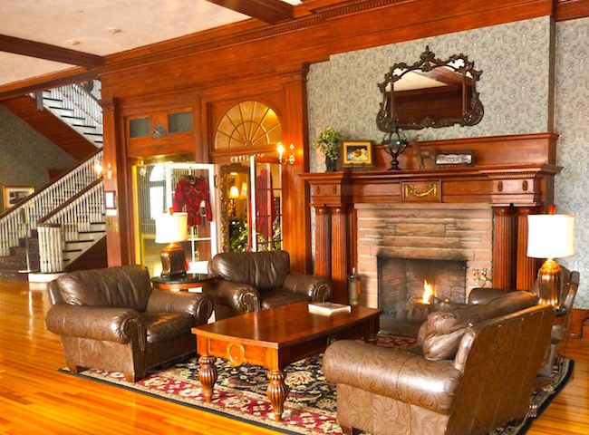 The lobby of The Stanley with grand staircase and one of two fireplaces Photo by Claudia Carbone