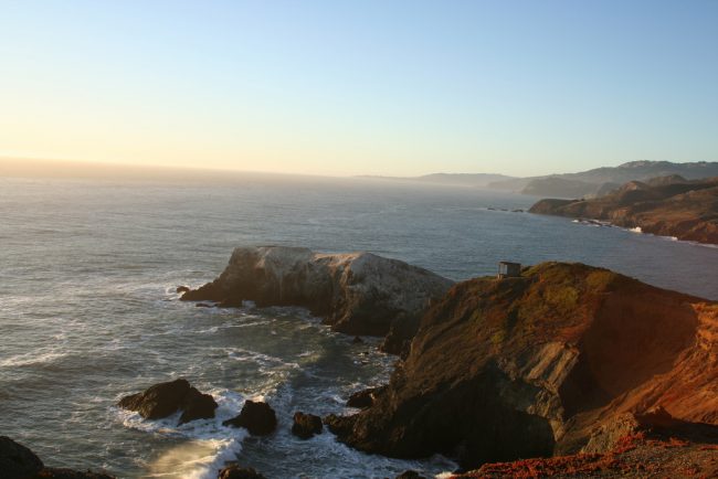 The sun sets along the shoreline in Marin County, California. Flickr/Colin Arthur