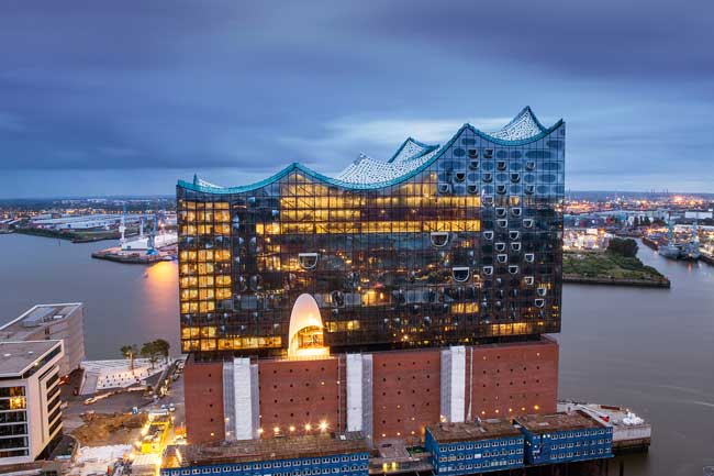 The Elbphilharmonie in Hamburg is surrounded by water on three sides. Photo by Hamburg Tourism, Thies Raetzke